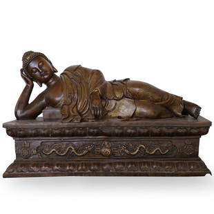 Chinese Bronze Laying Buddha: DESCRIPTION: A Chinese bronze depicts Mandalay buddha laying on one side, decorated with intricate foliate patterns and completed in a brown patina.CIRCA: 20th Cent.ORIGIN: ChinaDIMENSIONS: H: 31" L: