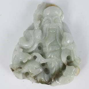 Chinese Carved Jade Medallion: DESCRIPTION: A Chinese carved jade medallion of Shou Xing, weilding a dragon scepter and a peach, standing beside a deer.CIRCA: 20th Ct.ORIGIN: ChinaDIMENSIONS: H:3" L:2.5"CONDITION: Great condition.