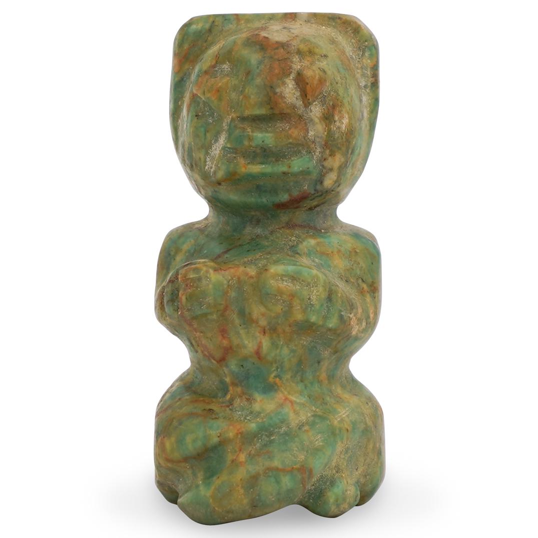 Chinese Jade Figure: DESCRIPTION: A spinach jade rock carved in the form of a figure with facial features and hands resting at the chest. CIRCA:Ã‚ ORIGIN: China DIMENSIONS: H. 3.75" CONDITION: Good condition. See lot d