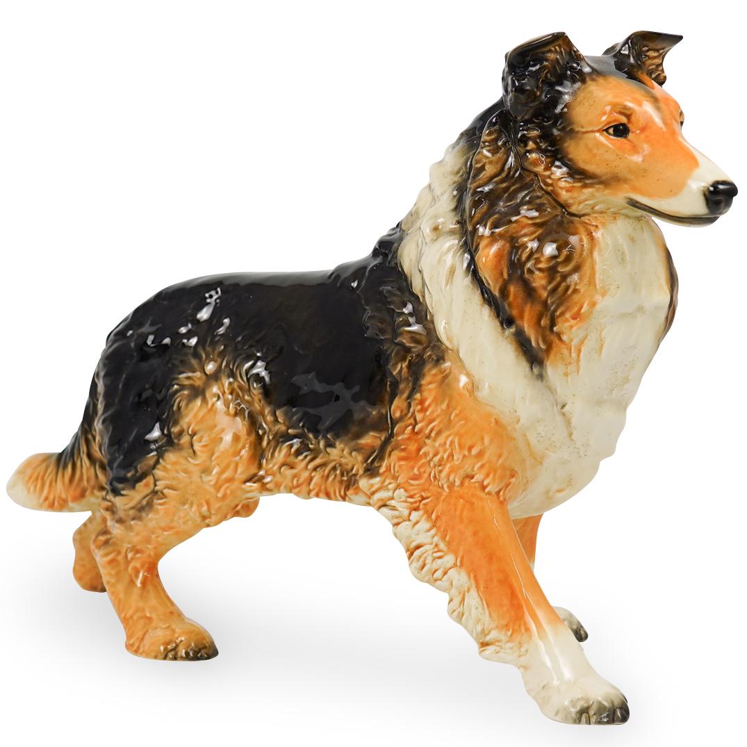 Goebel Porcelain Collie Dog: DESCRIPTION: A Goebel hand painted porcelain Collie dog. Labeled on the underside. CIRCA: 20th Century ORIGIN: Germany DIMENSIONS: H. 12". W. 16" x D. 5" CONDITION: Great condition. See lot descriptio