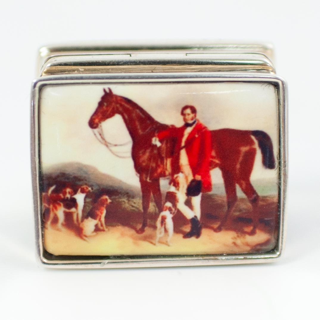 Sterling Silver Equestrian Pill Box: DESCRIPTION: A Sterling silver pill box. Garnished along the lid with a horse standing next to gentleman. Marked along the interior "Sterling". Total Weight: 22 grams CIRCA: USA ORIGIN: England DIMENS
