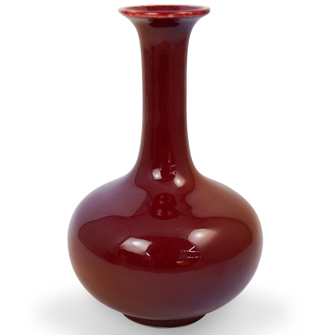 Sang de Boeuf Glazed Vase: DESCRIPTION: Antique Chinese porcelain vase. Rich sang de boeuf red flambe glaze. No apparent marking. CIRCA: 20th Century ORIGIN: China DIMENSIONS: H. 9.5" x W. 5.5" CONDITION: Great condition. See l