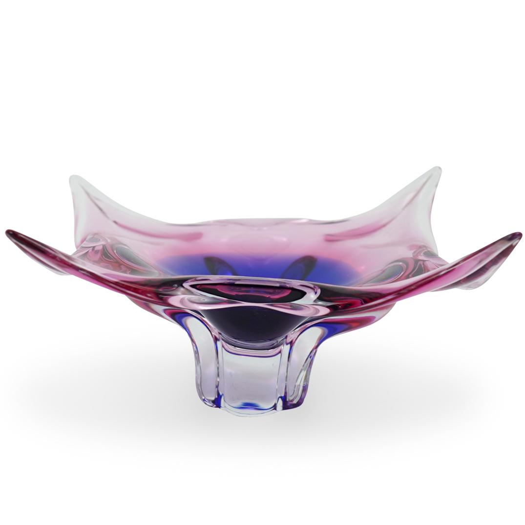 Licio Zanetti Glass Centerpiece: DESCRIPTION: A Licio Zanetti art glass floriform footed centerpiece bowl, in pink and purple color foundation. Signed on the underside, "Zanetti L." CIRCA: 20th Century ORIGIN: Italy DIMENSIONS: H. 5.