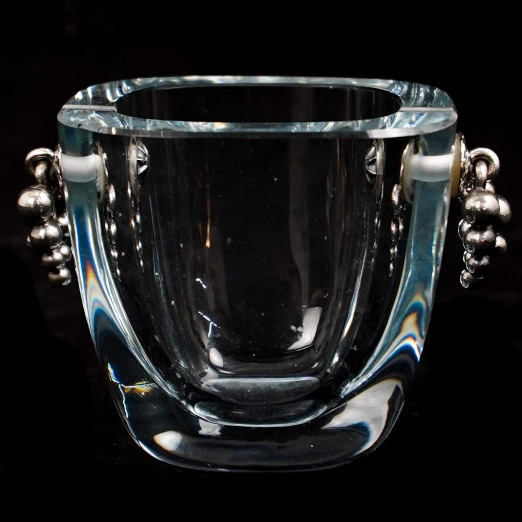 Scandinavian Crystal With Sterling Handles: DESCRIPTION: Scandinavian crystal with slightly beveled edge and sterling silver grape handles. CIRCA: 20th CenturyÃ‚ ORIGIN: ScandinaviaÃ‚ DIMENSIONS: H: 3" x 3.25" W CONDITION: Great condition