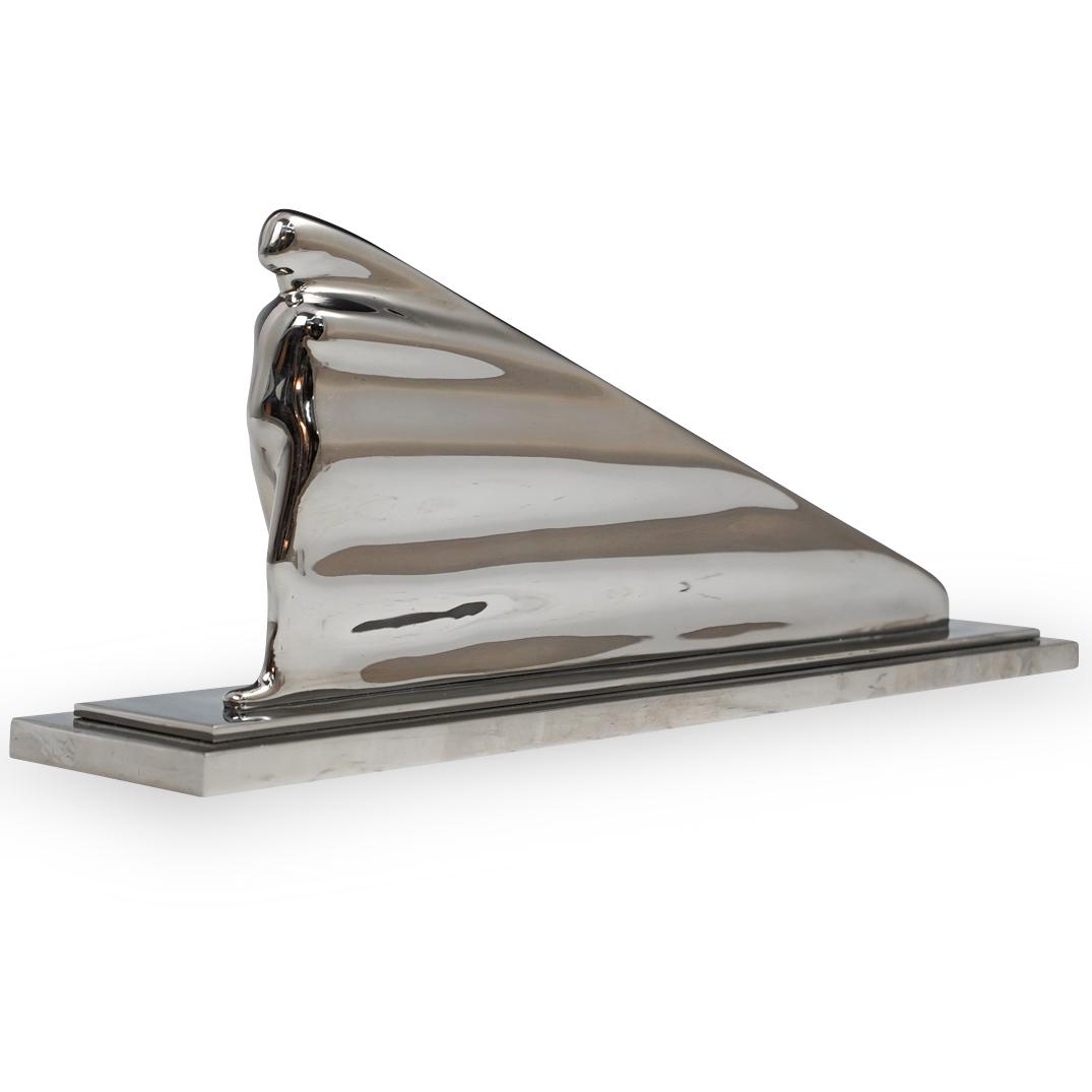 Ernest Trova (American.1927-2009) Stainless Flowing Man: DESCRIPTION: A sculpture by surrealist artist Ernest Trova composed of polished stainless steel depicts a study man elongated figure. Marked along the bottom "39/99 1972" with Trova stamp. Comes with