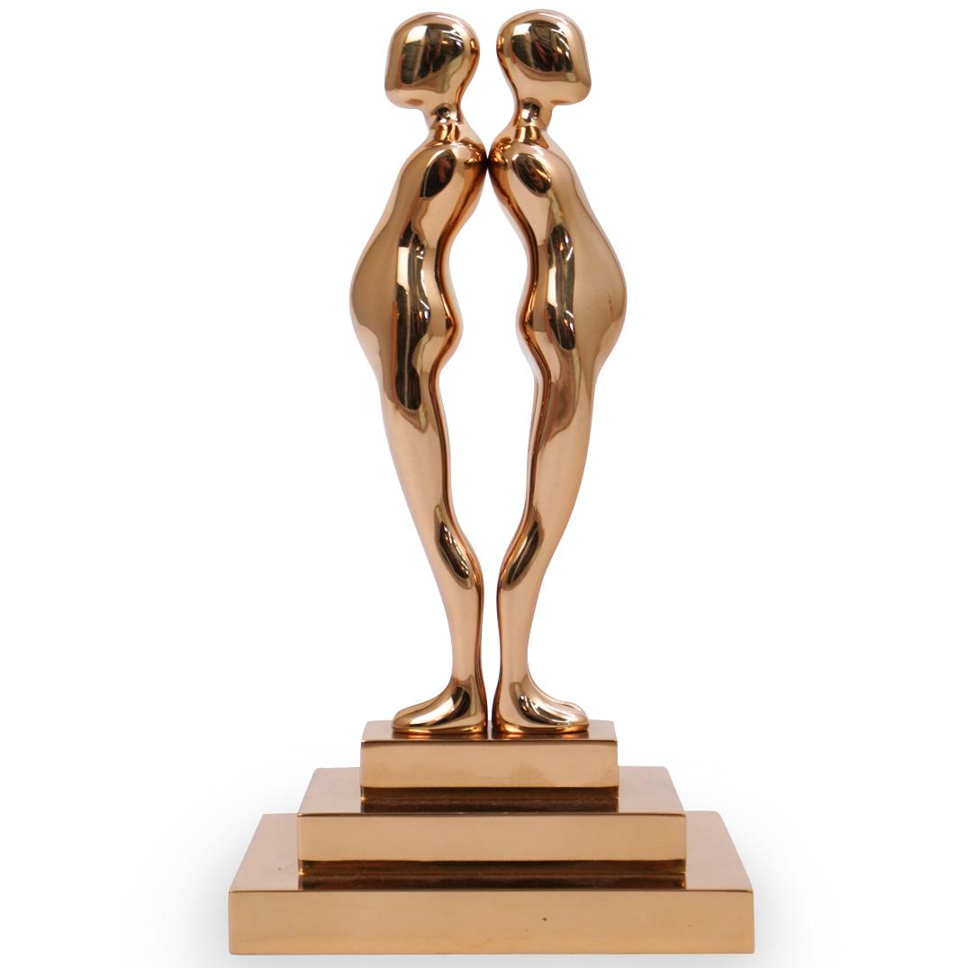 Ernest Trova (American.1927-2009) "Double Study Man": DESCRIPTION:DESCRIPTION: A sculpture by American surrealist Ernest Trova titled double study man sculpture, composed of polished bronze in gilded tones. Engraved with Trova mark, Numbered "73/99" and