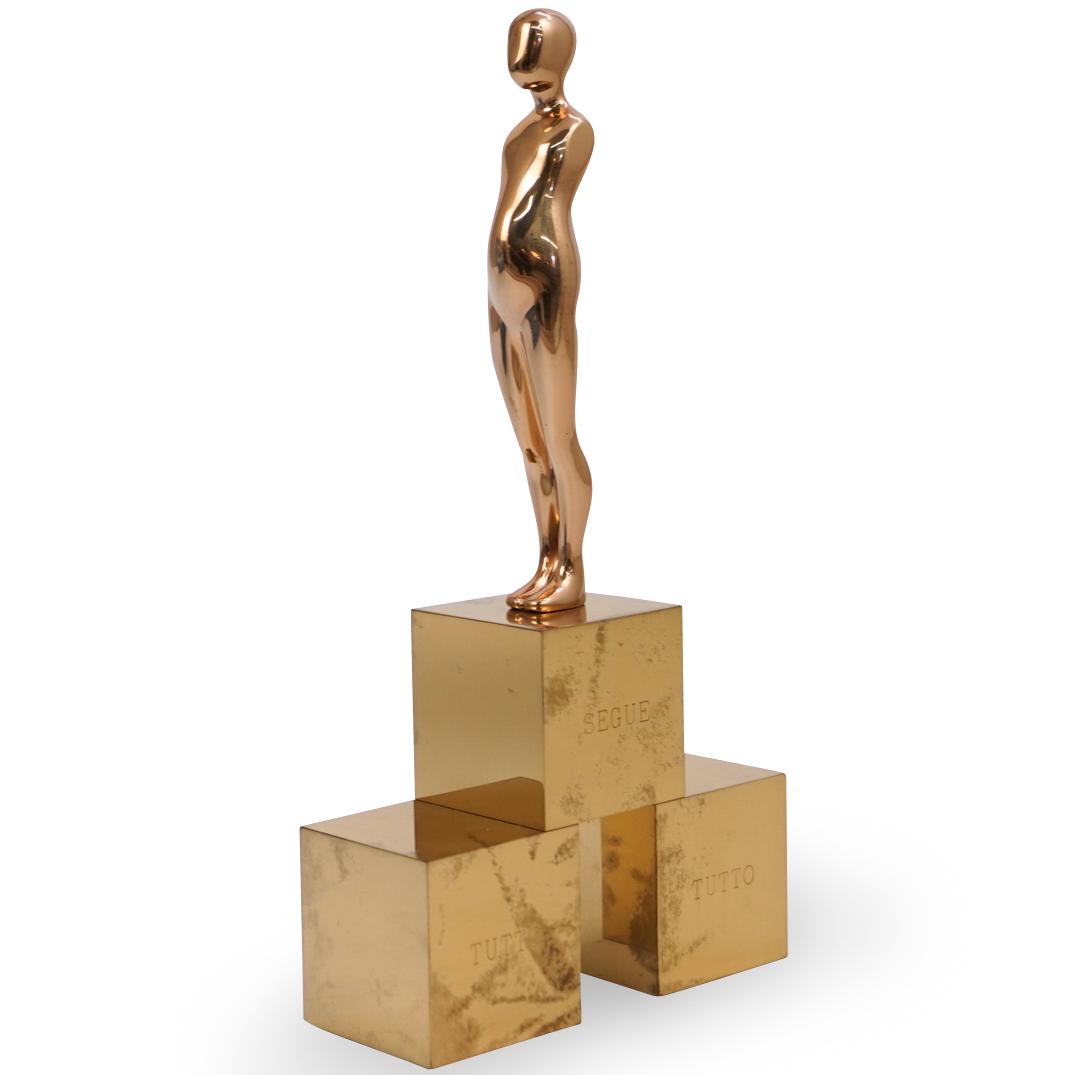 Ernest Trova (American, 1927-2009) "Everything Follows": DESCRIPTION: A sculpture by American surrealist Ernest Trova titled "Everything follows everything" composed of polished bronze in gilded tones. Engraved with Trova mark, "A.P. 4-10" and dated "1986".