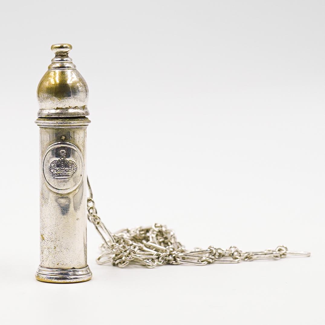 Silver Plated Chain Necklace with Pendant: DESCRIPTION: A closed top handled pitcher pendant with etched crown motif on center, on silver chain link chain. CIRCA: 20th Century ORIGIN: DIMENSIONS: L. 15" CONDITION: Great condition. See lot desc