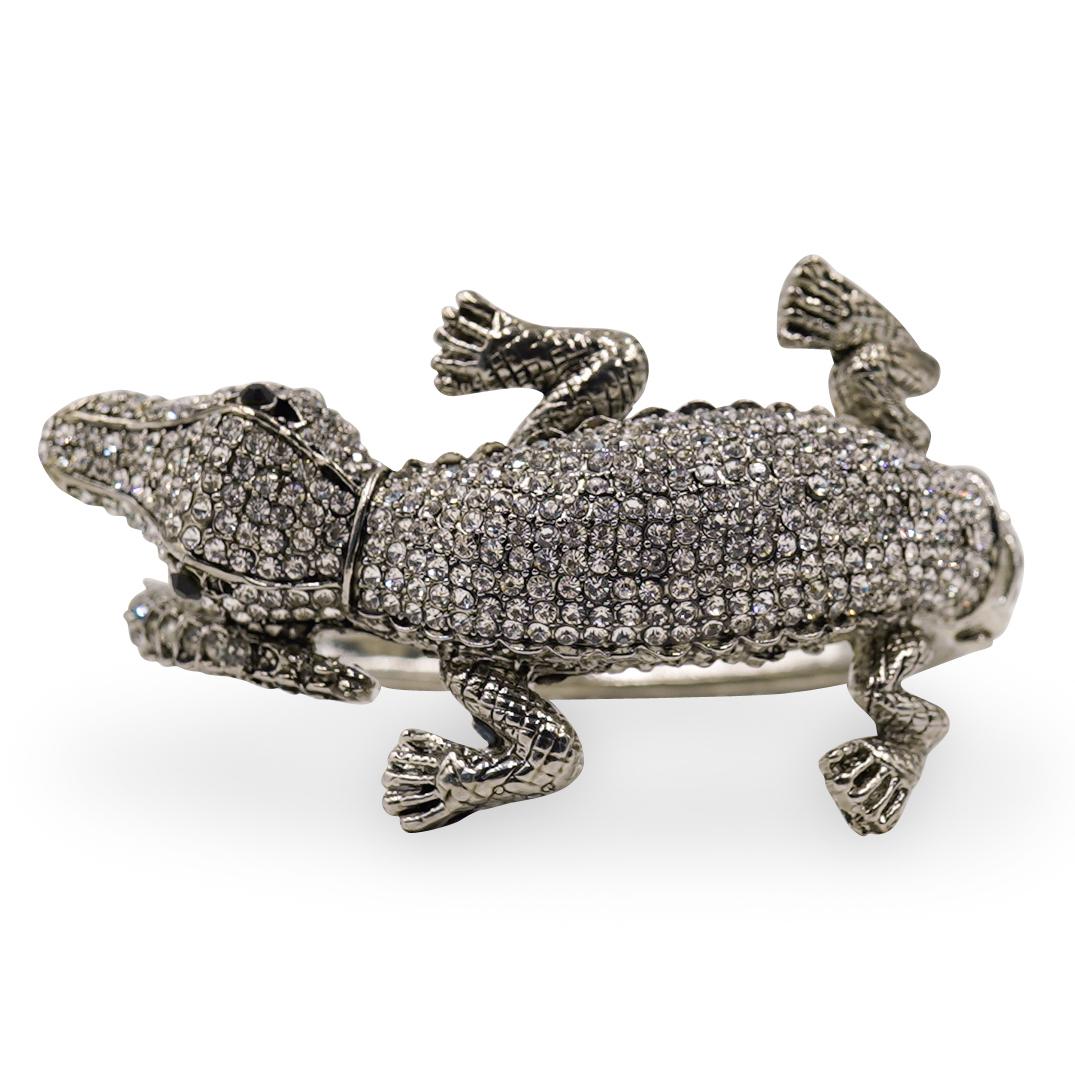 Costume Crystal Alligator Bracelet: DESCRIPTION: A Costume bracelet featuring a figural alligator, embellished with pave crystals. CIRCA: Late 20th Cent. ORIGIN: France DIMENSIONS: Diameter: 2.75" CONDITION: Great condition. See lot des