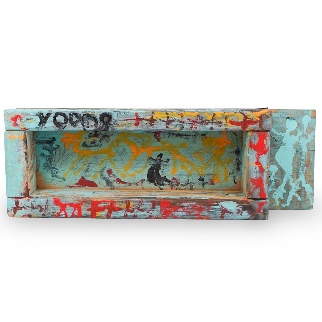 Purvis Young (American 1943-2010) Mixed Media: DESCRIPTION:A Purvis Young (American, 1943-2010) Mixed media composed of wood, Ink pen, and house paint. Featuring figural pattern with red, black, and yellow hues, with painting on exterior of work. 