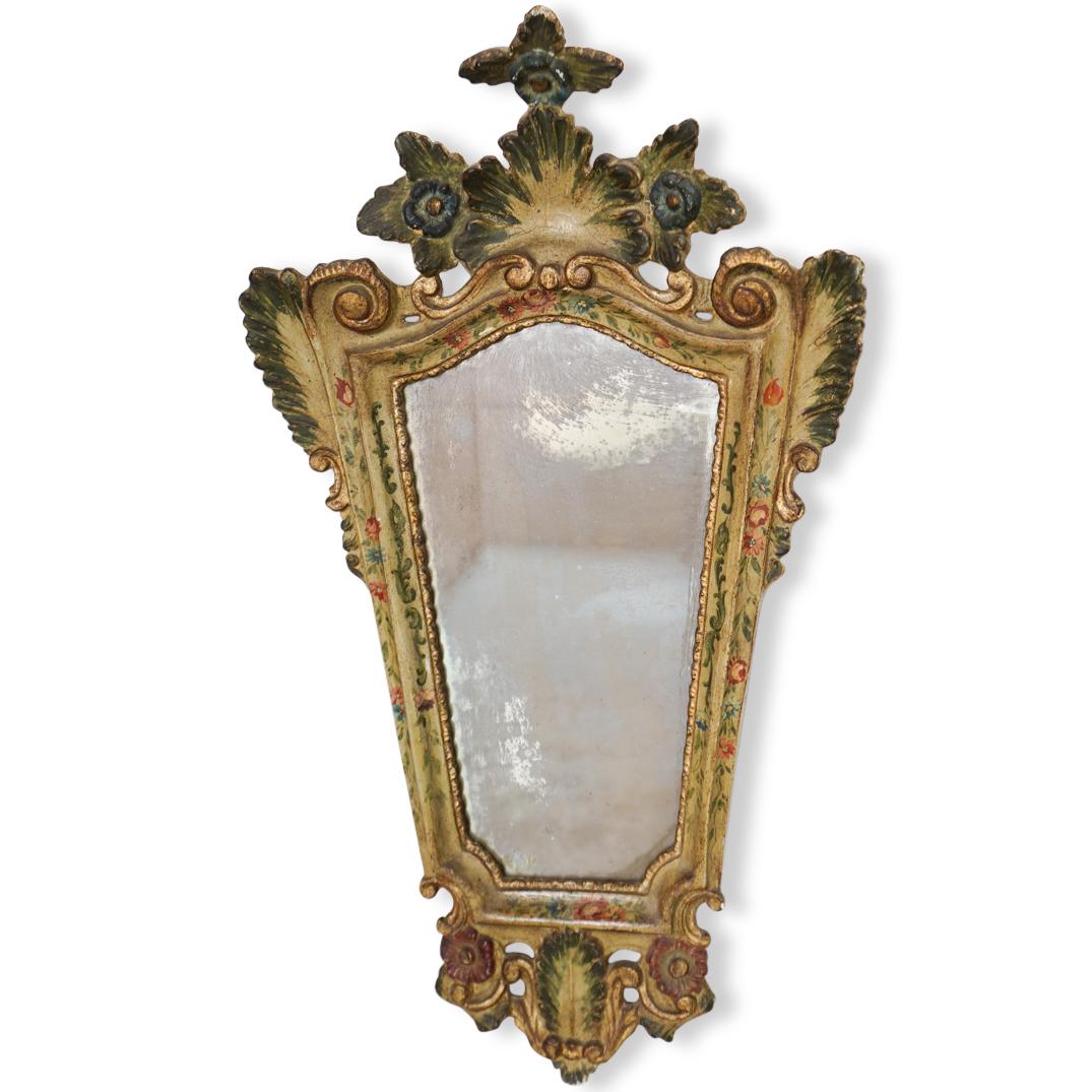 Italian Rococo Style Shaped Mirror: DESCRIPTION: Depicting a wood painted frame with shaped mirror. CIRCA: 20th Century ORIGIN: Italy DIMENSIONS: L. 32" x W. 18" CONDITION: Good/Fair condition. See lot description for details on item co