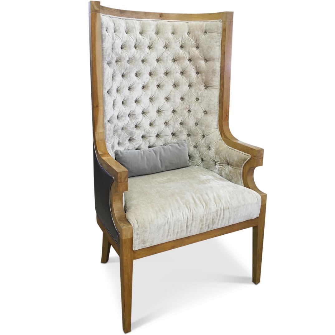 Shine By S.H.O Tufted Wingback Chair: DESCRIPTION: A modern chair designed by S.H.O or Susan Hornbeak-Ortiz features a tufted wingback design, supported by a wooden foundation. Tagged along the underside. CIRCA: 21st Cent. DIMENSIONS: H: