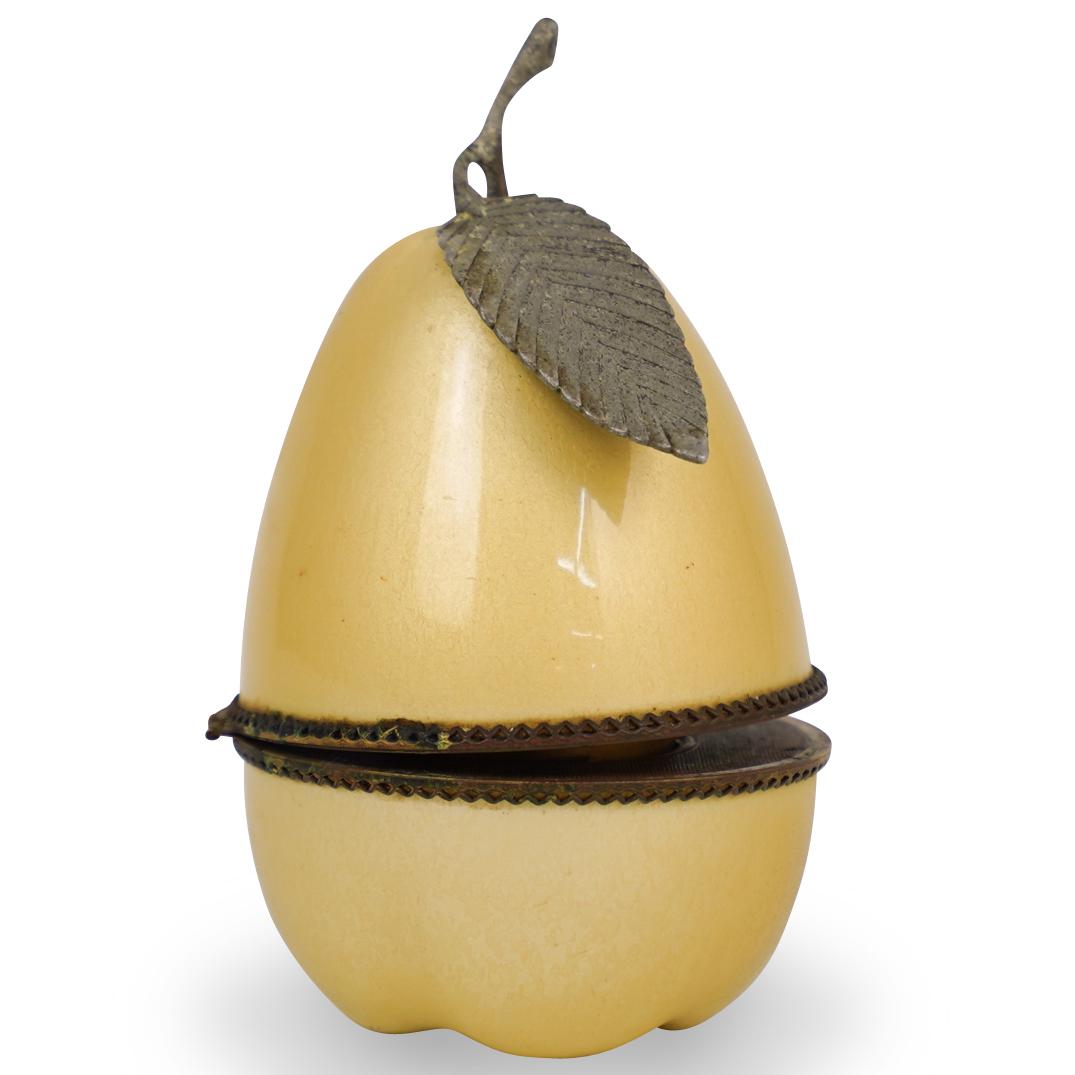 Enameled Pear Shaped Torch Lighter: DESCRIPTION: An enameled pear gas lighter, opens with hinge to reveal a gilded torch lighter and engraving that reads "Evans" CIRCA: 20th Ct. ORIGIN: Continental DIMENSIONS:H:5" x W: 3" CONDITION: Gre