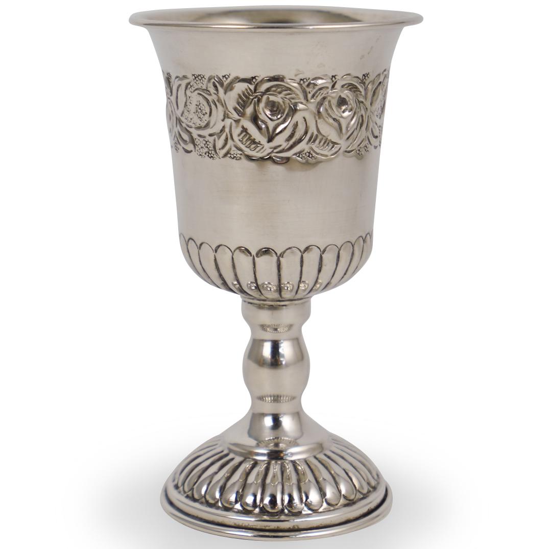 800 Silver Repousse Wine Cup: DESCRIPTION: A Hallmark 800 Silver Vintage cup/goblet with repousse floral rose designs. Weight: 86 grams. CIRCA: 20th Century ORIGIN: Continental DIMENSIONS:H. 5 3/8" x W. 3" CONDITION: Great conditi