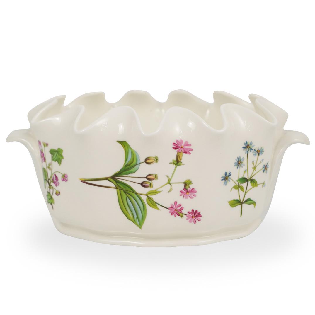 Mintons Porcelain Bowl: DESCRIPTION: A Large Porcelain scalloped bowl by Mintons decorated along the body with multicolored flowers, stamped along the underside with makers mark and #OA2070. CIRCA: 20th Cent. ORIGIN: England