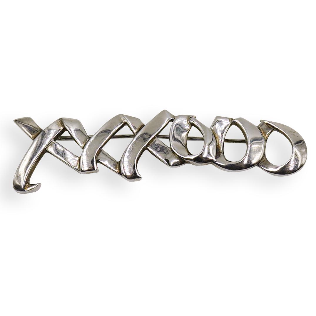 Tiffany & Co Picasso Graffiti XO Sterling Brooch: DESCRIPTION: Tiffany & Co Picasso Graffiti XO Sterling Brooch. Come with pouch and original box MARKED: Paloma Picasso, 925, Tiffany & Co. WEIGHT: 8.1 grams. CIRCA: 20th Century ORIGIN: USA DIMENSIONS
