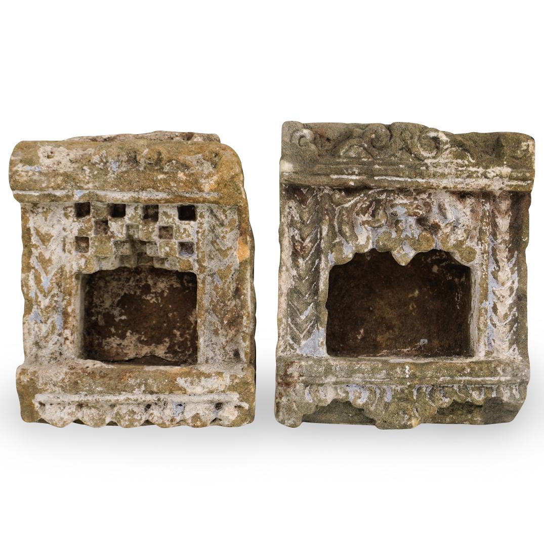 Pair of Concrete Candle Holders: DESCRIPTION: A pair of candle holders composed of carved concrete with remnants of multi colored paint.Ã‚ CIRCA:20th Ct. ORIGIN:ContinentalÃ‚ DIMENSIONS:H:9.5" x W:8.25" x D:5.5" CONDITION: Grea