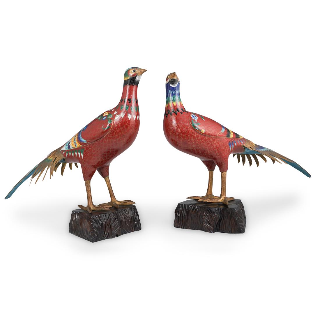 Pair Of Chinese Cloisonne Pheasants: DESCRIPTION: A pair Of Chinese Cloisonne pheasants feature a dark red ground hue, embellished with multicolored floral patterns, girl brass wriring, further accented by gilt wing tips and beak. Fitted
