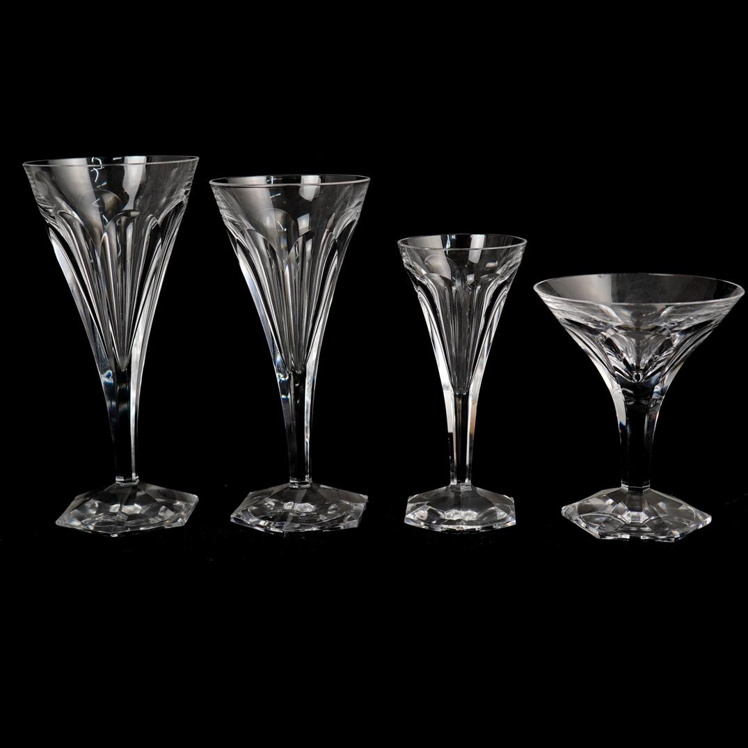 (28 Pc) Val St. Lambert Crystal Glasses: DESCRIPTION: A set of 28 Val St. Lambert crystal glasses, in the "Hafnia" pattern, features six sided panel cut on hexagonal base. Comprising of: 10 Champagne glasses, H. 5", 4 Wine glasses, H. 6 1/8"