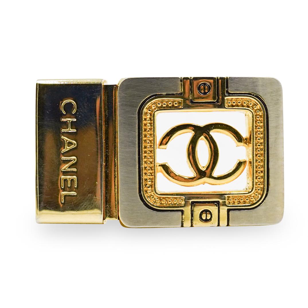 Chanel Belt Buckle: DESCRIPTION: A Chanel belt buckle in silver and gold tones.CIRCA:20th Ct.ORIGIN:ContinentalDIMENSIONS: L:2.25" x W:1.25"CONDITION: Great condition. See lot description for details on item condition. M