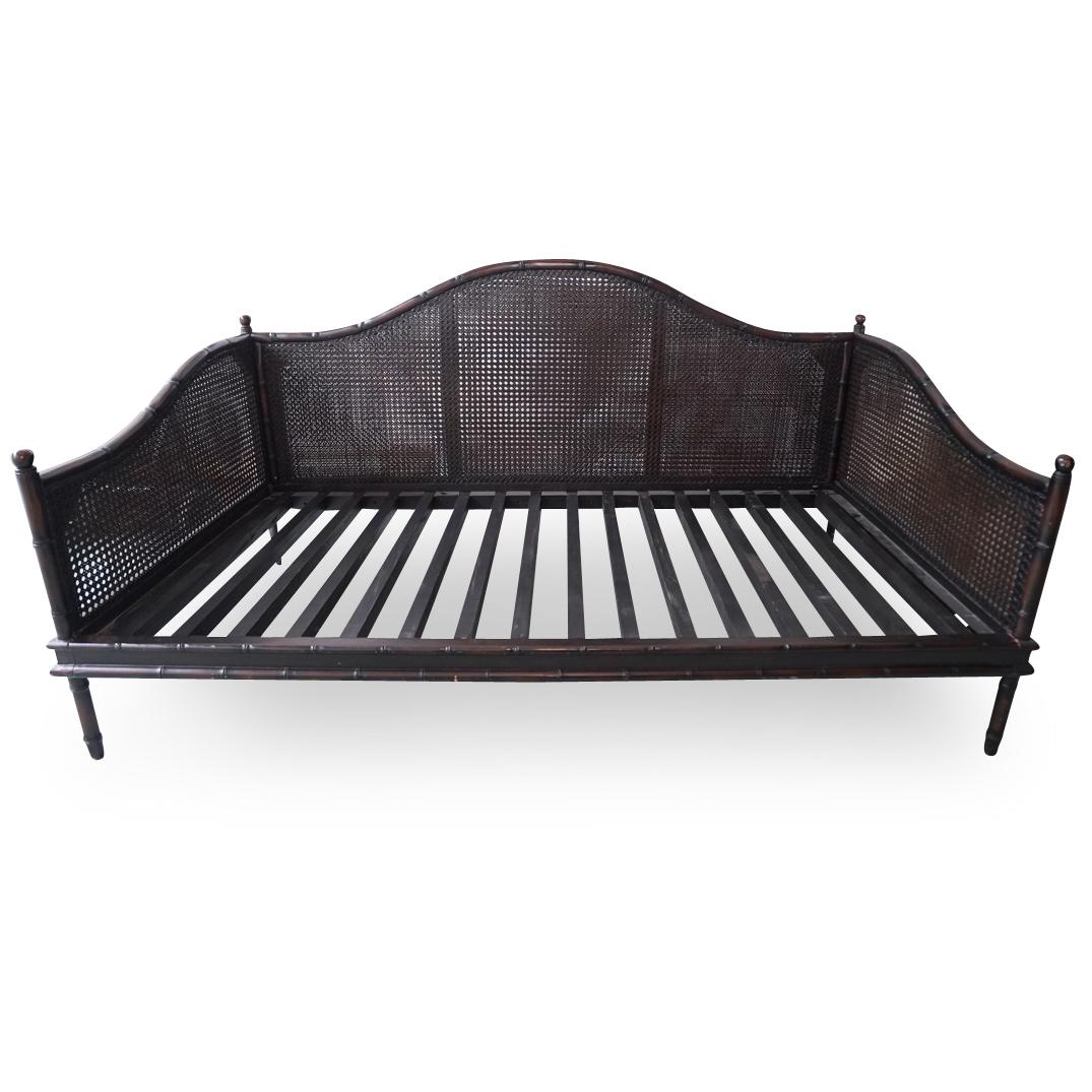 Bamboo Motif Cane Daybed: DESCRIPTION: A dark bamboo motif foundation woven cane daybed.CIRCA: 21st Ct.ORIGIN: PhilippinesDIMENSIONS: H: 39.5" x W: 40" x L: 77"CONDITION: Pre-owned. See lot description for details on item cond