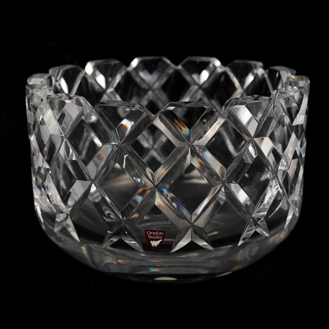 Orrefors Crystal Bowl: DESCRIPTION: An Orrefors crystal bowl, signed on bottom with "Orrefors Sweden" label.CIRCA:20th Ct.ORIGIN:SwedenDIMENSIONS: H:5.25" x D:8"CONDITION: Great condition. See lot description for details on
