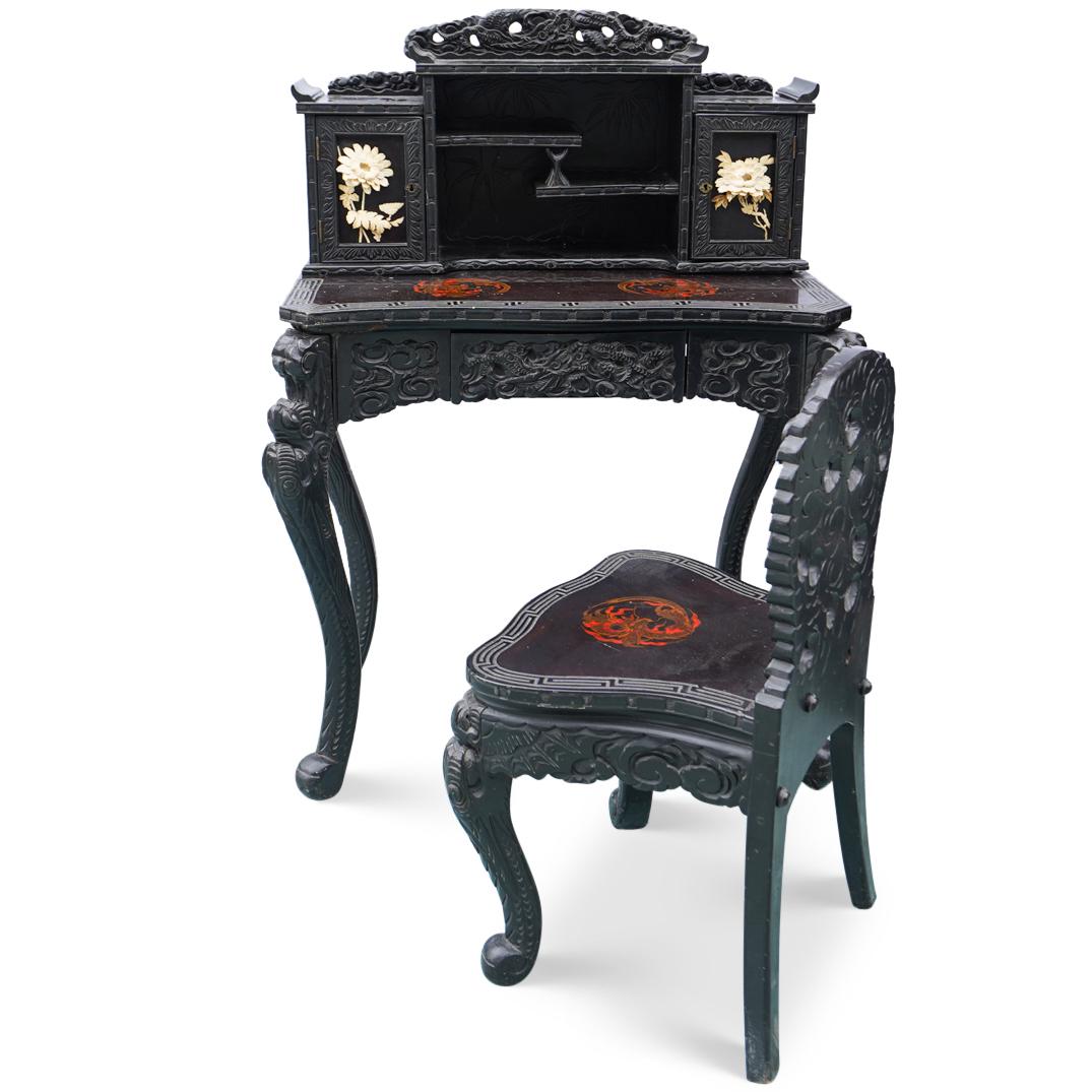Antique Japanese Wood Vanity: DESCRIPTION: An antique Japanese vanity desk with chair composed of hand carved wood adorned with carved bone flowers and painted dragon motifs, tiered shelves, two storage cabinet doors and one drawe