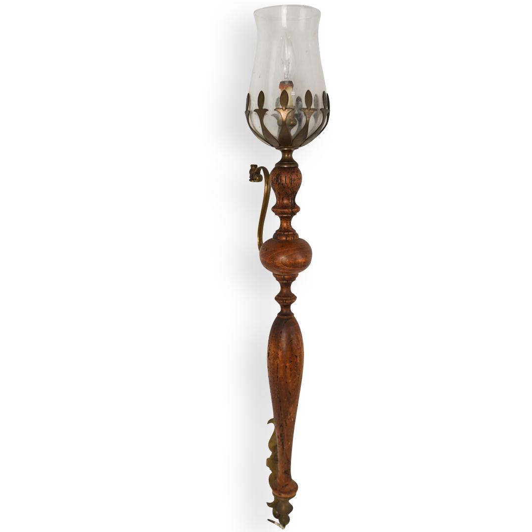 Antique Wood Sconce: DESCRIPTION: An antique wall mounted wired sconce composed of wood and metal. CIRCA: 20th Ct. ORIGIN: Continental DIMENSIONS: H: 37.5" x L: 7.5" CONDITION: Great condition, Wire cut. See lot descripti