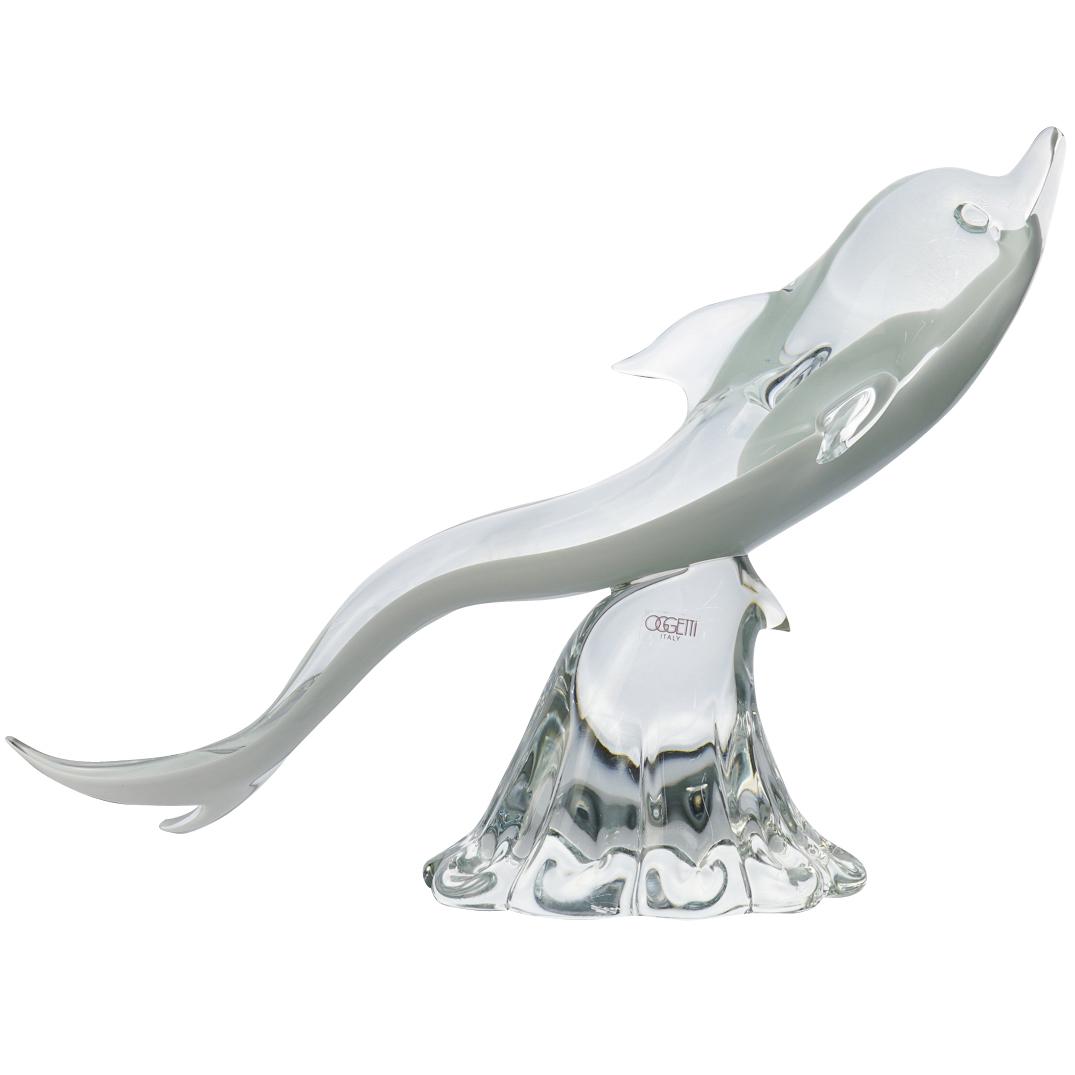 Elio Raffaeli (Italian b.1936) Oggetti Murano Glass: Oggetti Murano Glass figurine features a white undertone depicting a dolphin cresting on a wave . Etched signature to underside "Elio Raffaeli ". Has Original Oggetti sticker. CIRCA: 20th Ct. ORIGIN: