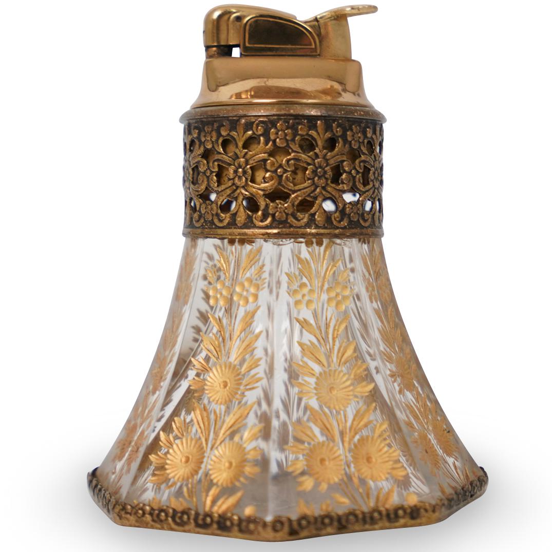 Antique Moser Lighter: Antique Moser Lighter. Embellished with gilded, enameled, floral motifs and spotted accents. Finished in an overall multi faceted design. CIRCA:20th Ct ORIGIN: Czech Republic DIMENSIONS: H:4.5 W:3.5 C