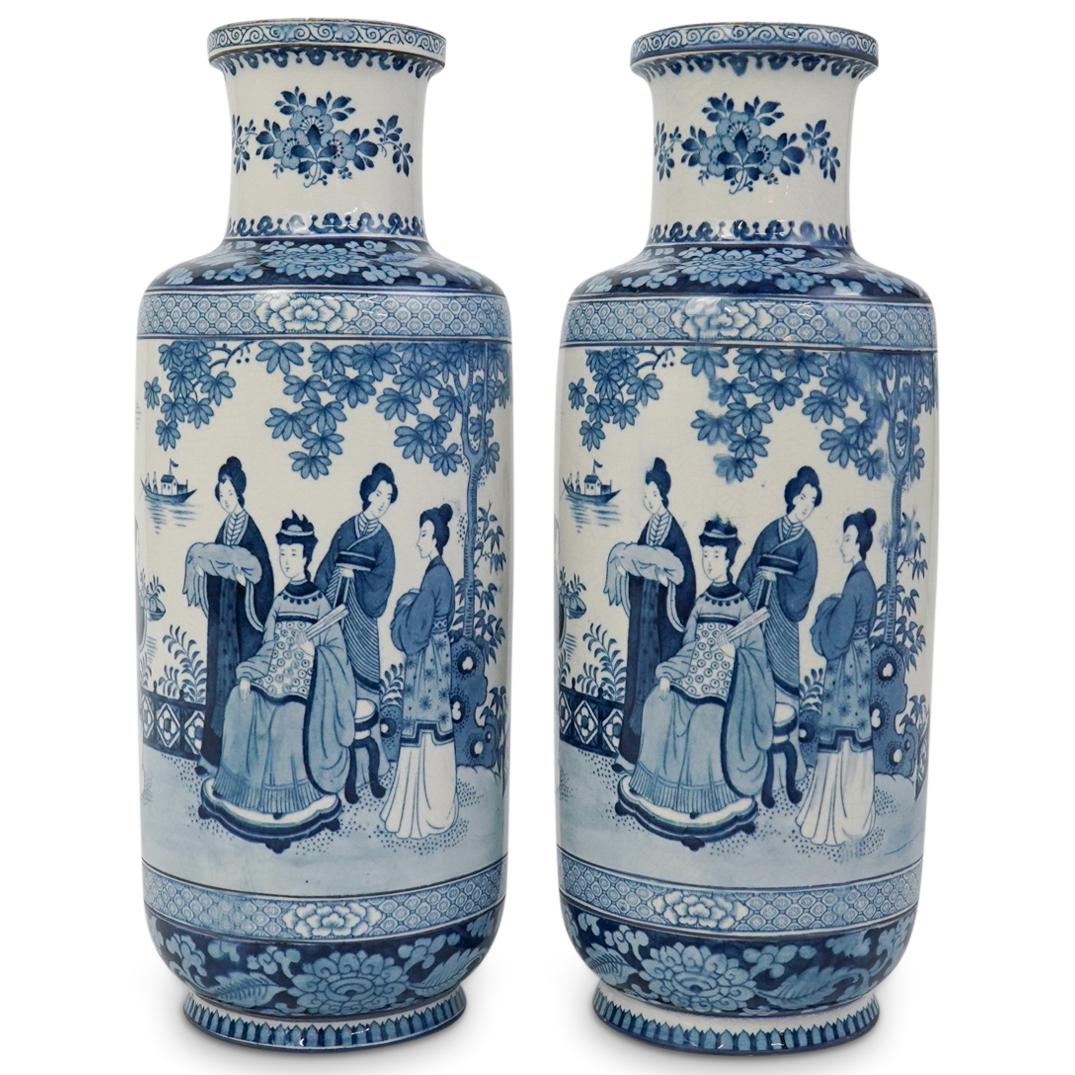 Pair Of Booths English Porcelain Vases: A pair of "Booths" English blue and white porcelain vases with Chinese scenes. Bottom marked "Booths, Silicon, Chin, Minc, England" CIRCA: 20th Ct. ORIGIN: England DIMENSIONS: H: 9.5" x D: 3.75" CONDI