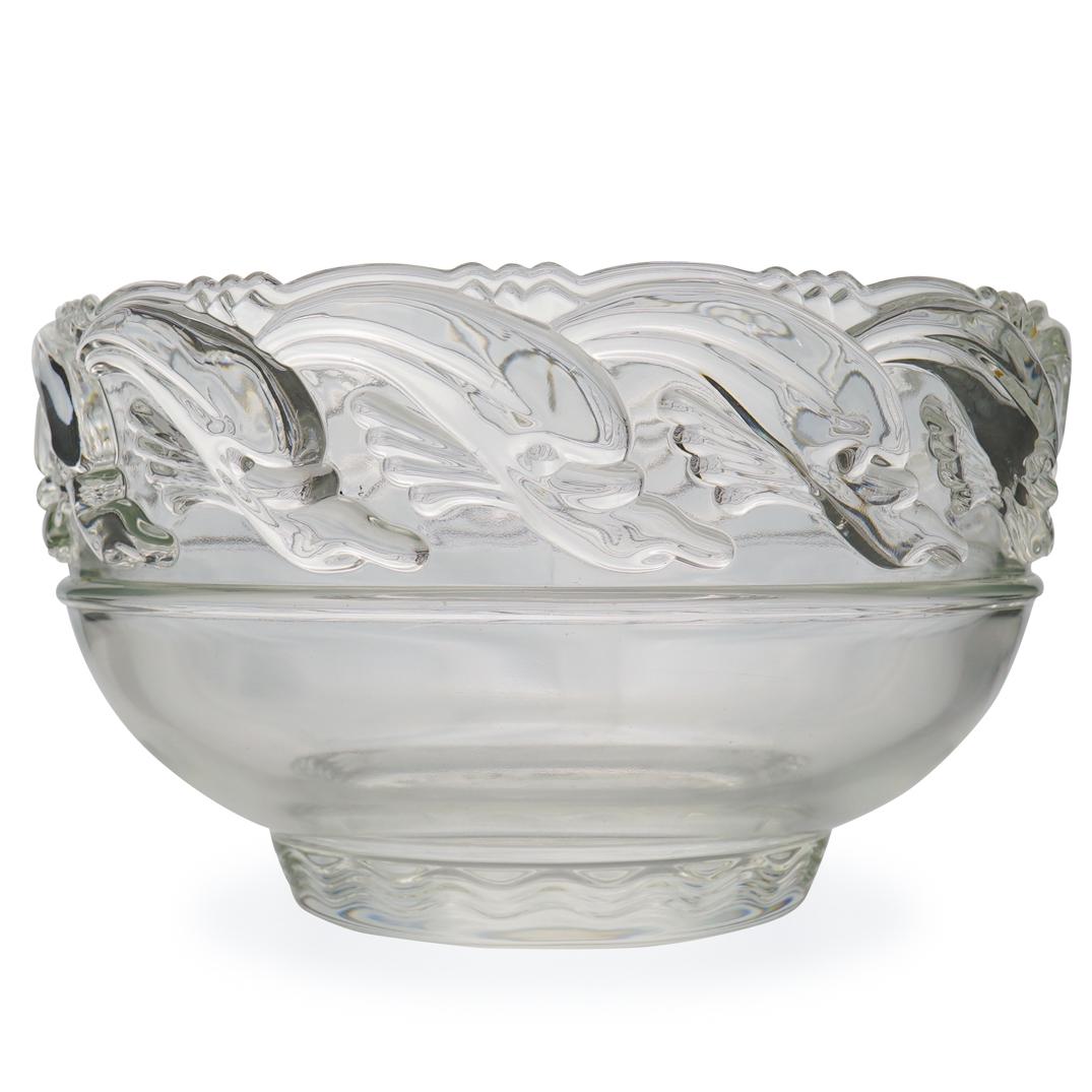 Tiffany & Co. Crystal "Dolphin Bowl": DESCRIPTION: A Tiffany & Co. crystal bowl decorated with embossed dolphin motifs along the rim. Marked along the underside:"Tiffany & co."CIRCA: 20th Ct.ORIGIN: USADIMENSIONS: H: 5" x D: 8.5"CONDITION