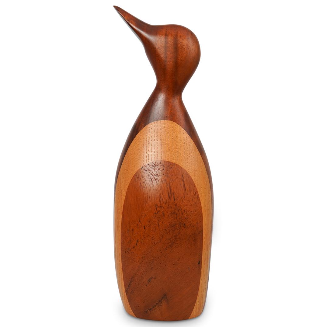 Paul Lamontagne Wood Penguin Sculptor: DESCRIPTION: Wooden sculpture depicting a penguin, carved by Paul Lamontagne. Signed "Paul Lamontagne 87" on the bottom.CIRCA: 20th CenturyORIGIN: USADIMENSIONS: L 18.5" x W 6.0"CONDITION: Great condi
