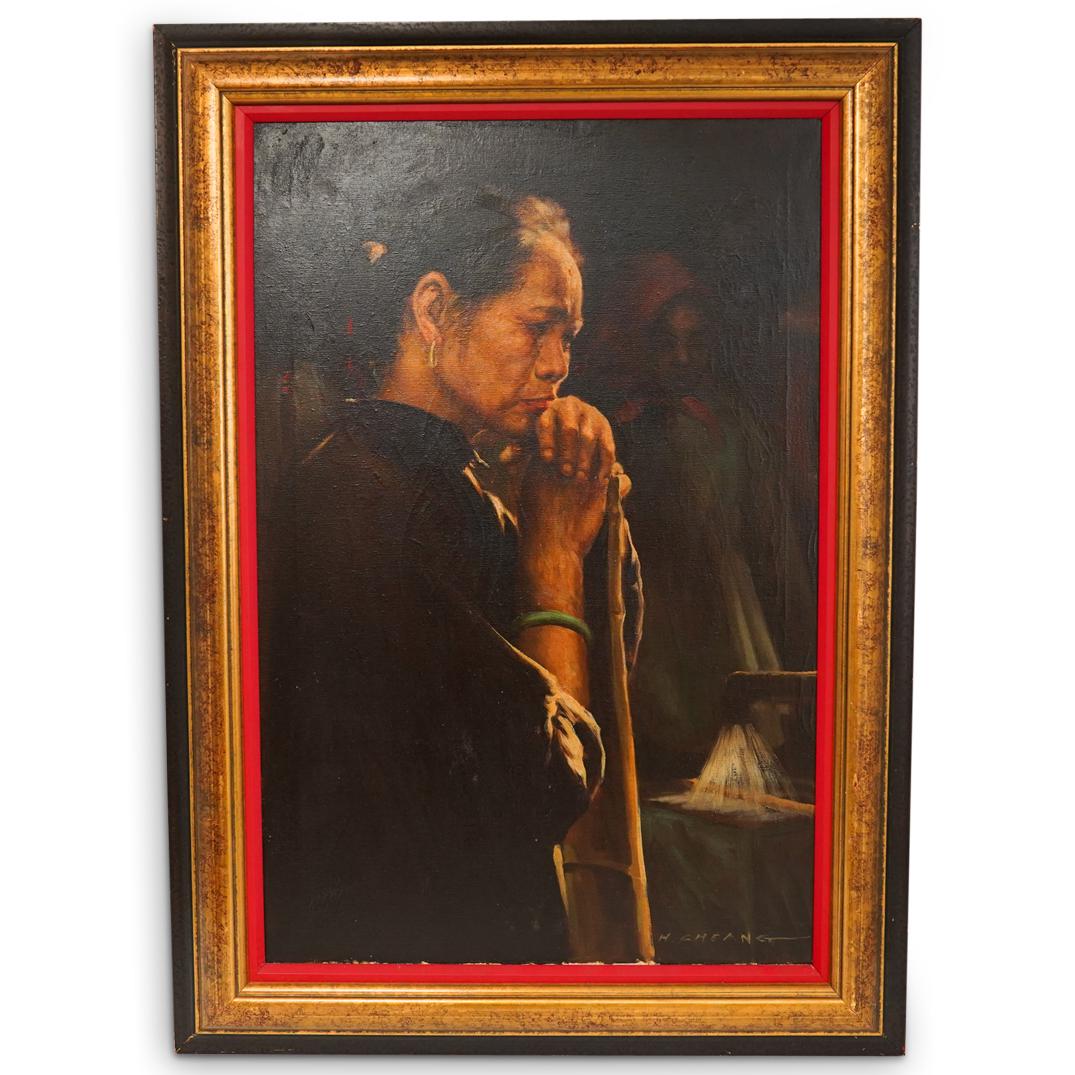 H. Cheang Signed Oil On Canvas: DESCRIPTION: H. Cheang oil on canvas painting featuring the portrait of a pondering women surrounded by distant faded figures. Signed lower right "H. Cheang" Mounted in red, gold and rust colored fram