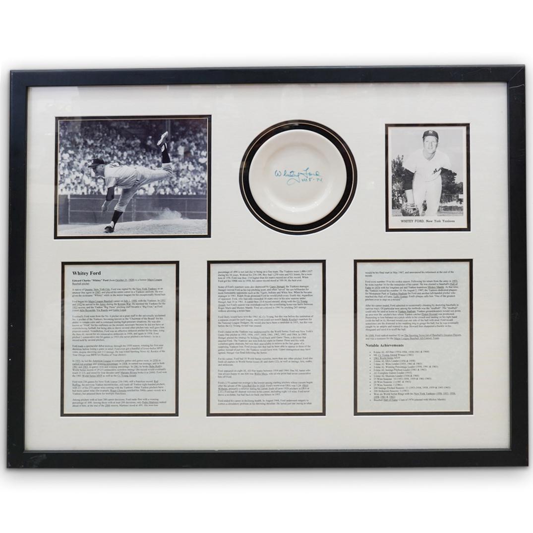 Framed Whitey Ford Autographed Memorabilia: DESCRIPTION: Baseball player Whitey Ford's framed memorabilia gallery, features an autographed porcelain plate, photos, and a three page biography. Includes "JSA " and "Charles C. Rutigliano", certifi