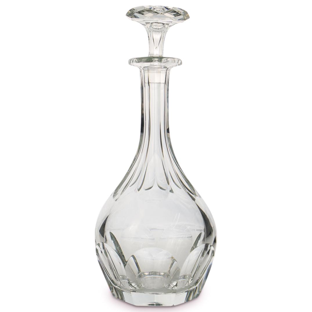 Baccarat Crystal Decanter: DESCRIPTION: A Baccarat crystal decanter. Features rounded rectangular cuts along the body and sharp diamond cuts along the stopper. Marked on bottom with Baccarat seal. CIRCA: 20th Ct. ORIGIN: France