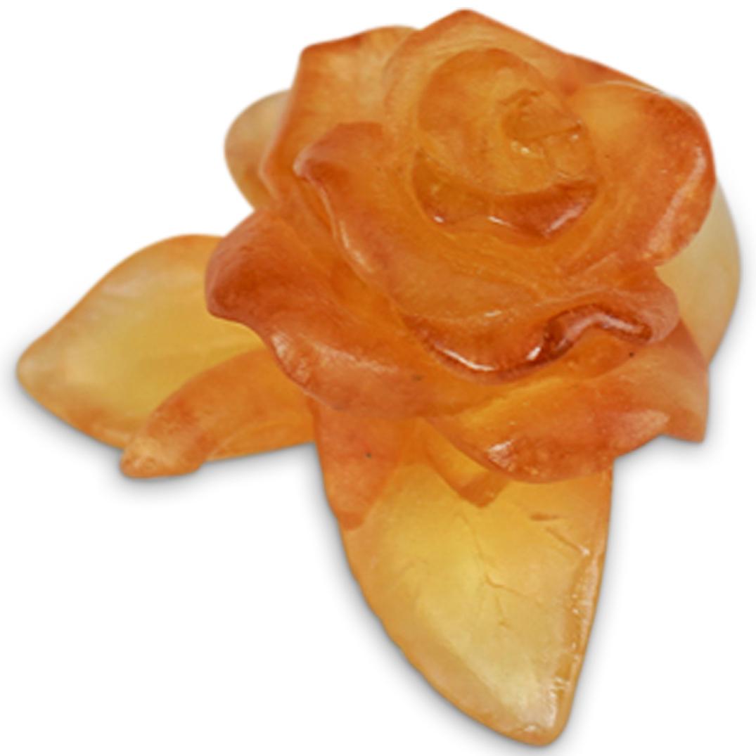 Daum Pate De Verre Crystal Amber Rose: DESCRIPTION: Crystal amber colored rose composed of pate de verre glass. Sign "Daum"on bottom side. CIRCA: 20th Century ORIGIN: France DIMENSIONS: L 2.0" x W 2.0" CONDITION: Great condition. See lot d