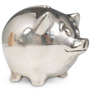 Tiffany & Co Silver Piggy Bank: DESCRIPTION: Tiffany & Co Silver Piggy Bank features a large coin slot on top and marked " Tiffany & Co 925, Italy " on the bottom. CIRCA: 20th ORIGIN:Italy DIMENSIONS:H:3.5" W:4.5" D:4: CONDITION: Gr