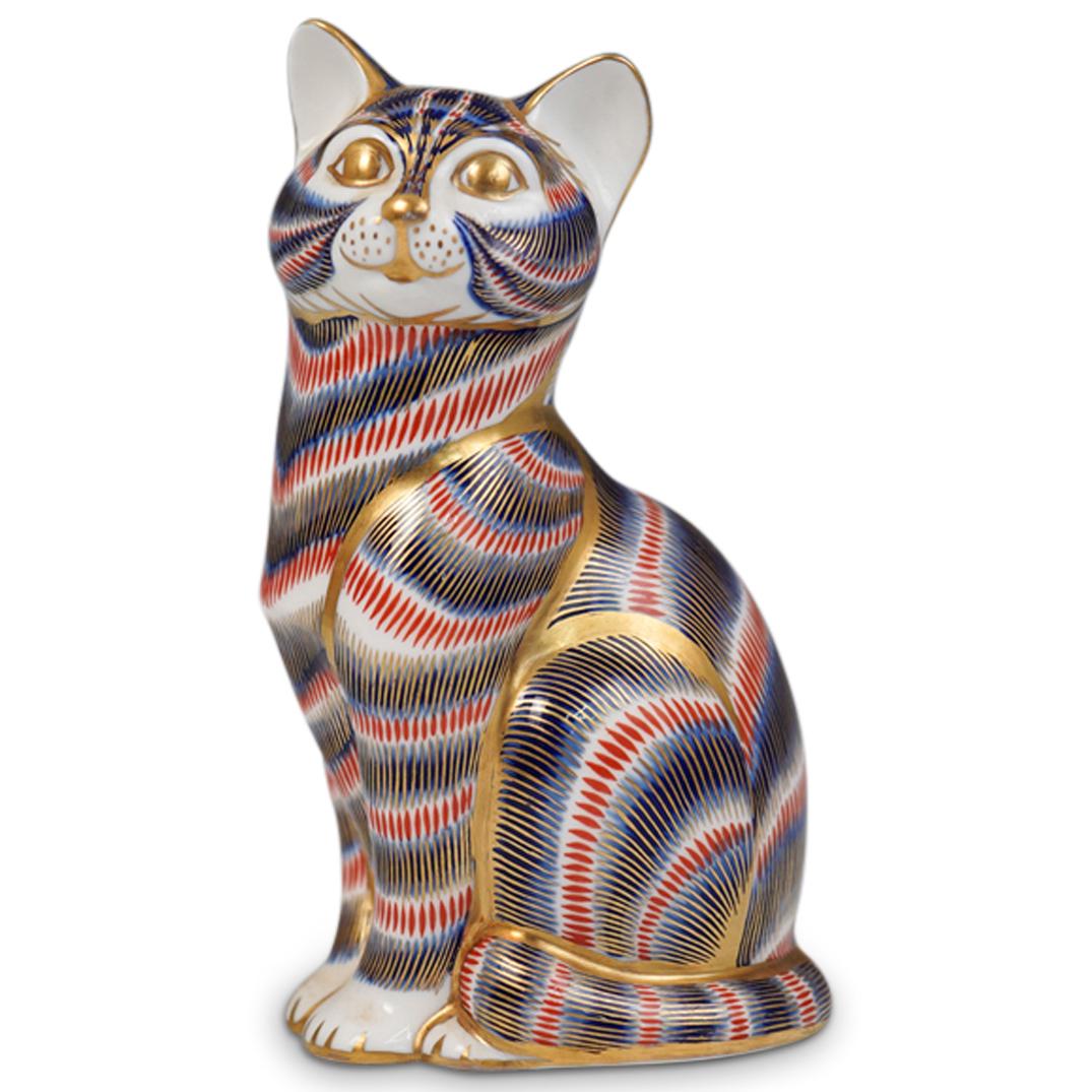 Royal Crown Derby Cat Figurine: DESCRIPTION: A Royal Crown Derby cat figurine. Featuring a porcelain cat with multi colored gilt accented design. Bottom marked "Royal Crown Derby English Bone China" CIRCA: 20th Ct. ORIGIN: England D