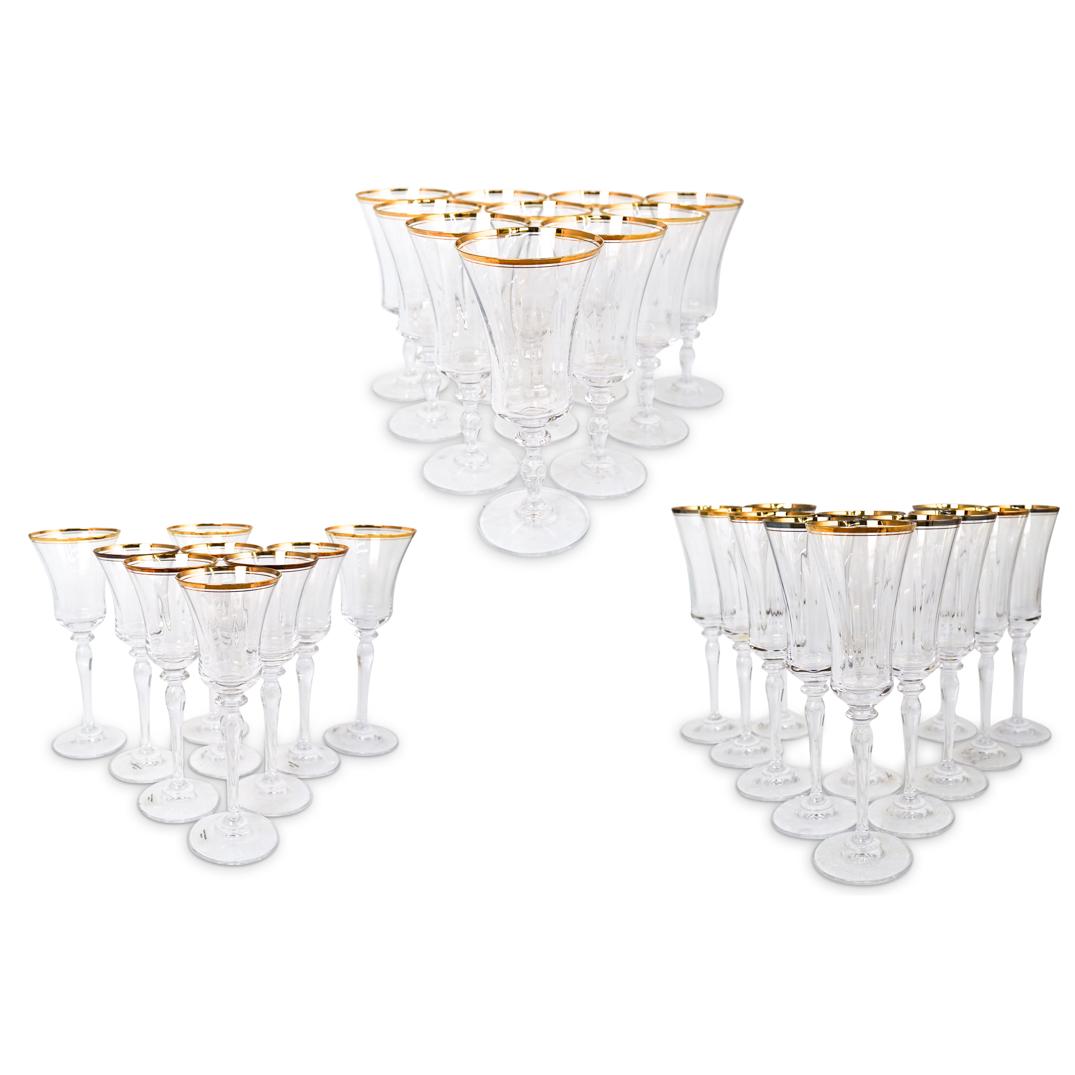 (30 Pc) Set of Gilt Rim Glasses: DESCRIPTION: Set of gilt rim glasses: (3) Gilt rim red wine glass (H 9.5") (6) Gilt rim white wine glass (H 9.0") (10) Gilt rim water glass (H 8.5") (11) Gilt rim champagne glass (H 9.0") CIRCA: Late 