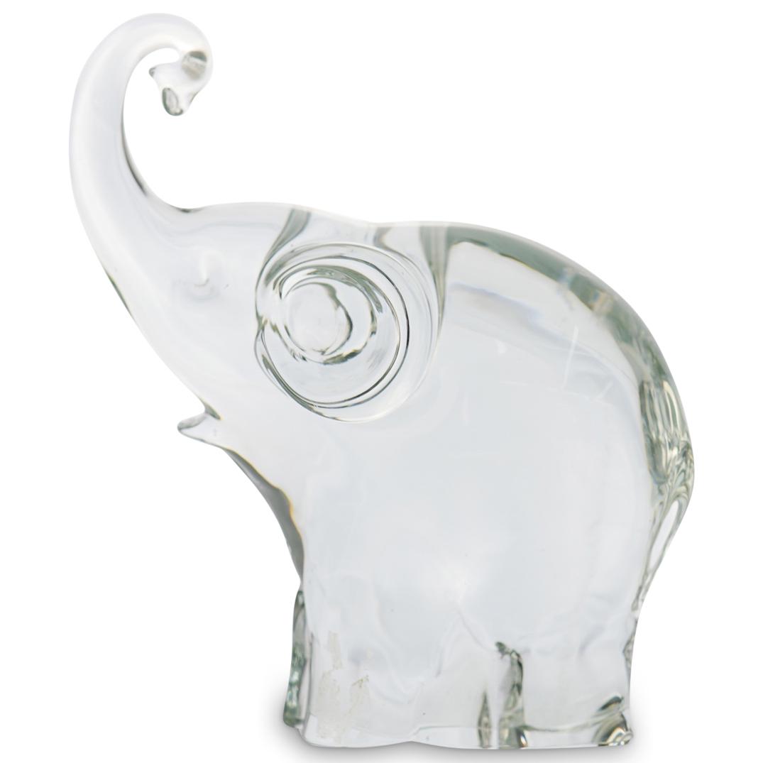 Alfredo Barbini Glass Elephant: DESCRIPTION: An Alfredo Barbini glass blown elephant figurine. Composed of clear hand blown glass depicting an elephant with a raised trunk. Signed on bottom "Barbini, Murano" CIRCA: 20th Ct. ORIGIN: 