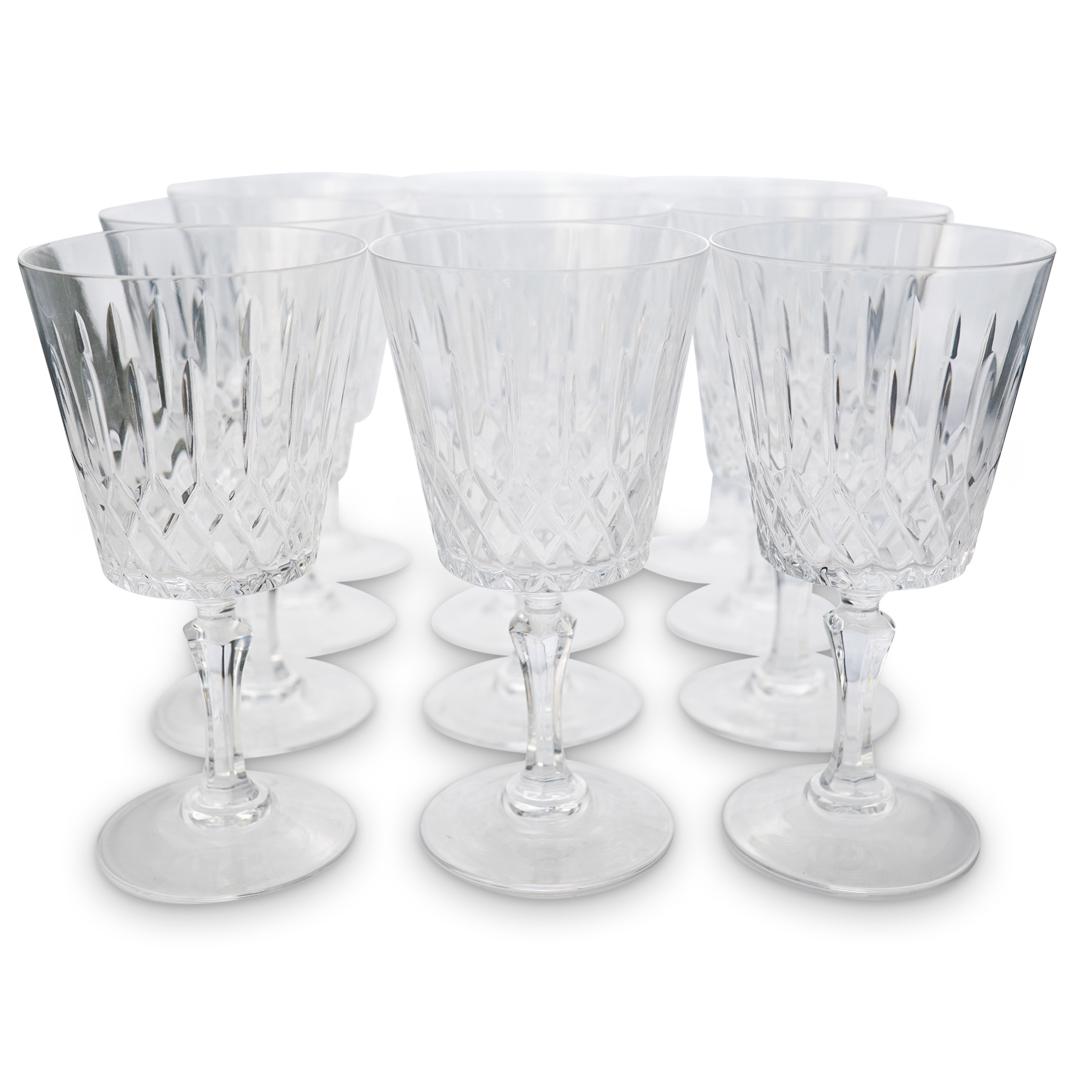 (22 Pc) Set of Crystal Cut Glasses: DESCRIPTION: Set of crystal cut glasses includes: (10) Crystal red wine glass adorning diamond cuts along the body of the glass. (H 5.5" x W 2.75") (12) Crystal white wine glass adorning diamond cuts 