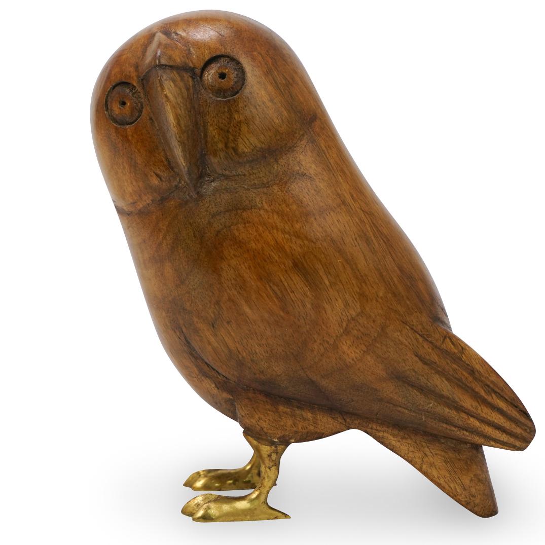 Sergio Bustamante Wood Owl Sculpture: DESCRIPTION: A mid century Sergio Bustamante hand carved wooden owl sculpture finished on two brass feet. CIRCA: 1950-1970s ORIGIN: Mexican DIMENSIONS: H:9" L:8" D:4" CONDITION: Great condition. See l