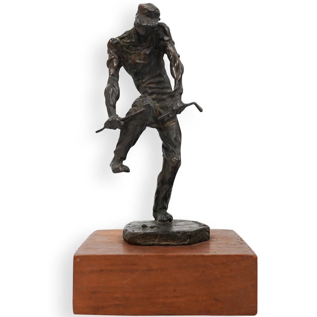 Bronze "Angry Golfer" Sculpture: DESCRIPTION: Bronze "Angry Golfer" Sculpture. Features a male figure breaking a golf club with his knee. Illegibly signed. Sits on a square wood base. CIRCA: 20th Century ORIGIN: USA DIMENSIONS:H:6.5"