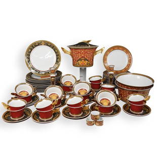 (65 Pcs) Versace Rosenthal "Medusa" Porcelain Set: DESCRIPTION: Versace Rosenthal "Medusa" Porcelain Set decorated in red and black tones, accented by gilt ornate trims and Medusa heads. Marked along the underside. Comes with original boxes. Composed