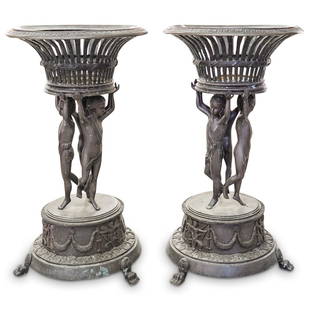 Att. Claude Michele Clodion Bronze Planters: DESCRIPTION: A large pair of bronze planters attributed to French Sculpture by Claude Michel Clodion, embellished by three Greco-Roman figures supporting a circular pierced bowl, standing on an overal