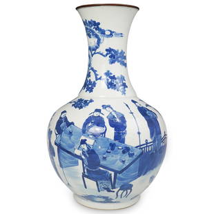 Chinese Qing Dynasty Porcelain Vase: DESCRIPTION: A Chinese Qing dynasty porcelain vase in a blue and white figural group finished with a large tree and floral motif. Double blue ring at the bottom. The item was gifted from a Chinese