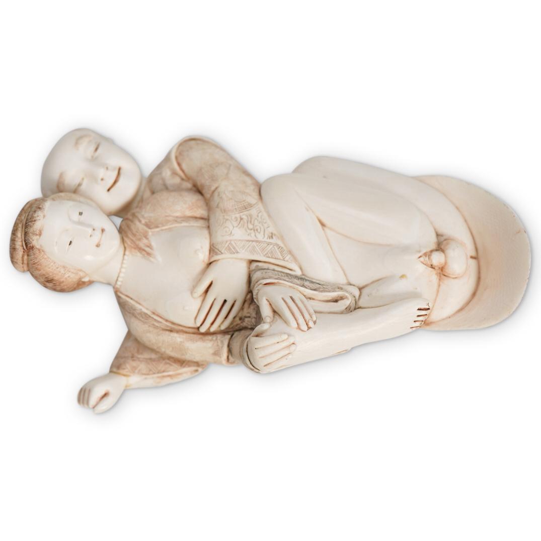 Antique Japanese Carved Bone Erotic Sculpture: DESCRIPTION: Antique Japanese hand carved bone sculpture featuring a Japanese erotic couple. Signed in Japanese red characters on the bottom. CIRCA: Late 19th to early 20th ct ORIGIN: Japan DIMENSIONS