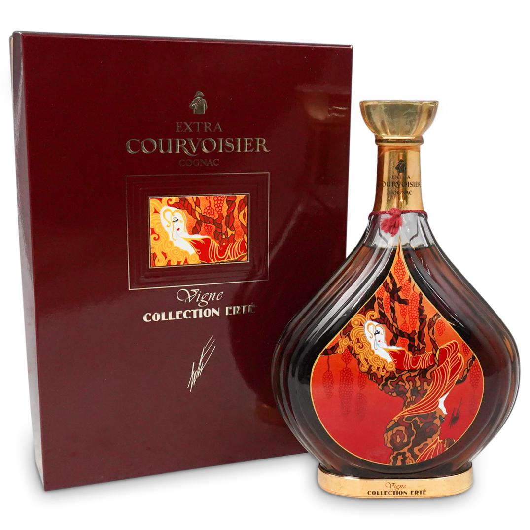 Erte "Vigne" Courvoisier Cognac No. 1: DESCRIPTION: Romain 'Erte' de Tirtoff 'Vigne" Courvoisier Cognac No. 1. New in sealed original box with packaging and COA. CIRCA: 20th Ct ORIGIN: France DIMENSIONS:Bottle H: 10" x D: 6.5", Box H: 11.5