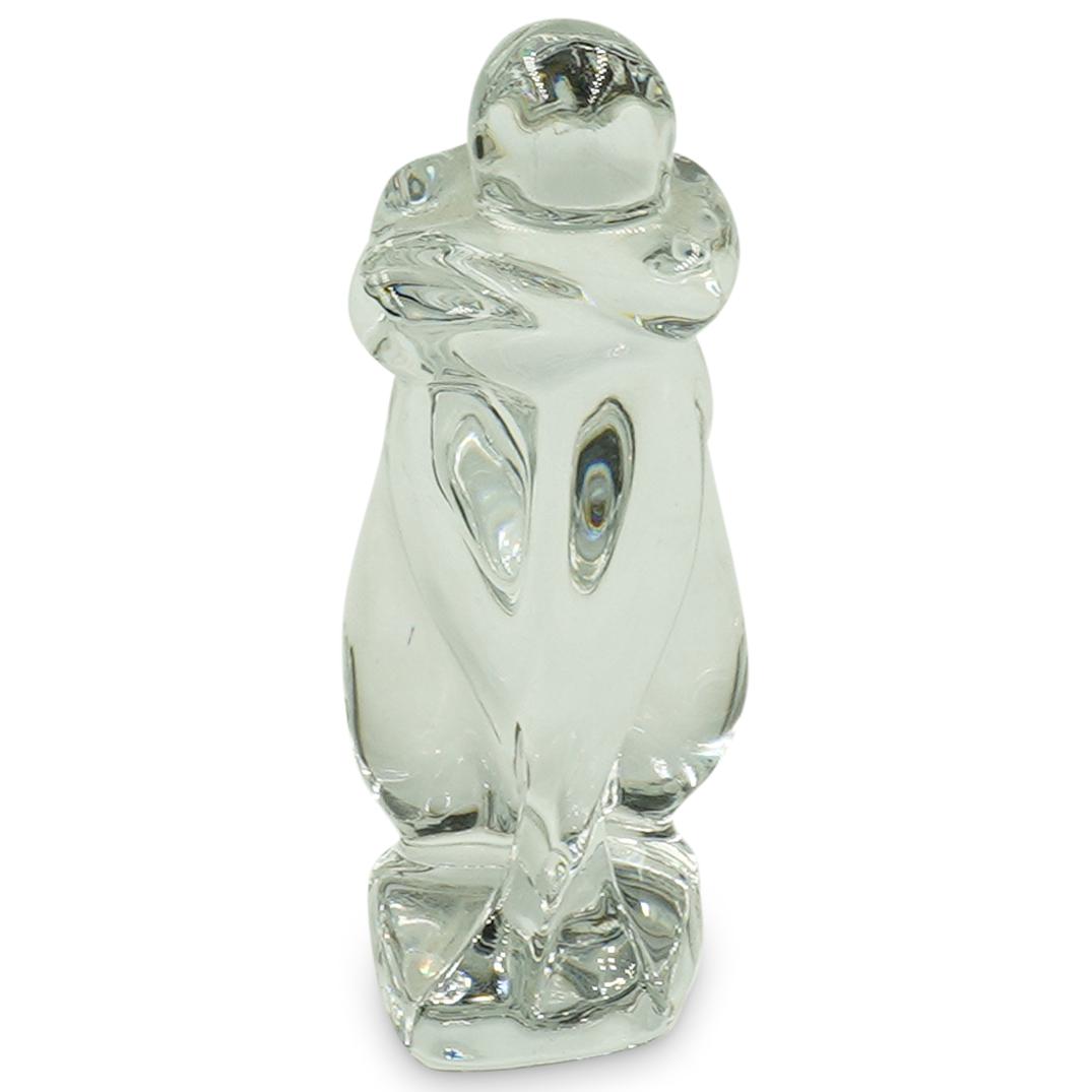 Robert Rigot Baccarat Figurine: DESCRIPTION: A baccarat crystal figurine of a nude lady with her arms crossed in a seated position by Robert Rigot. Traditional Baccarat stamp on the bottom and signed on the side RIGOT BACCARAT. CIRC